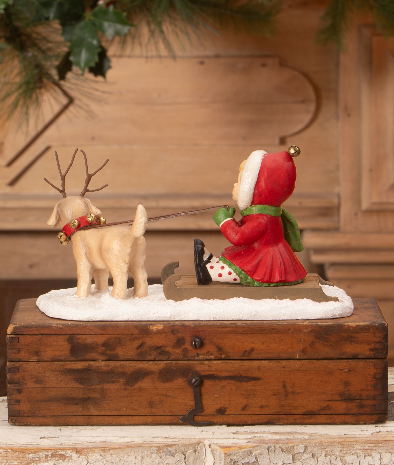Bethany Lowe Clare Sledding with Dog dressed as a reindeer
