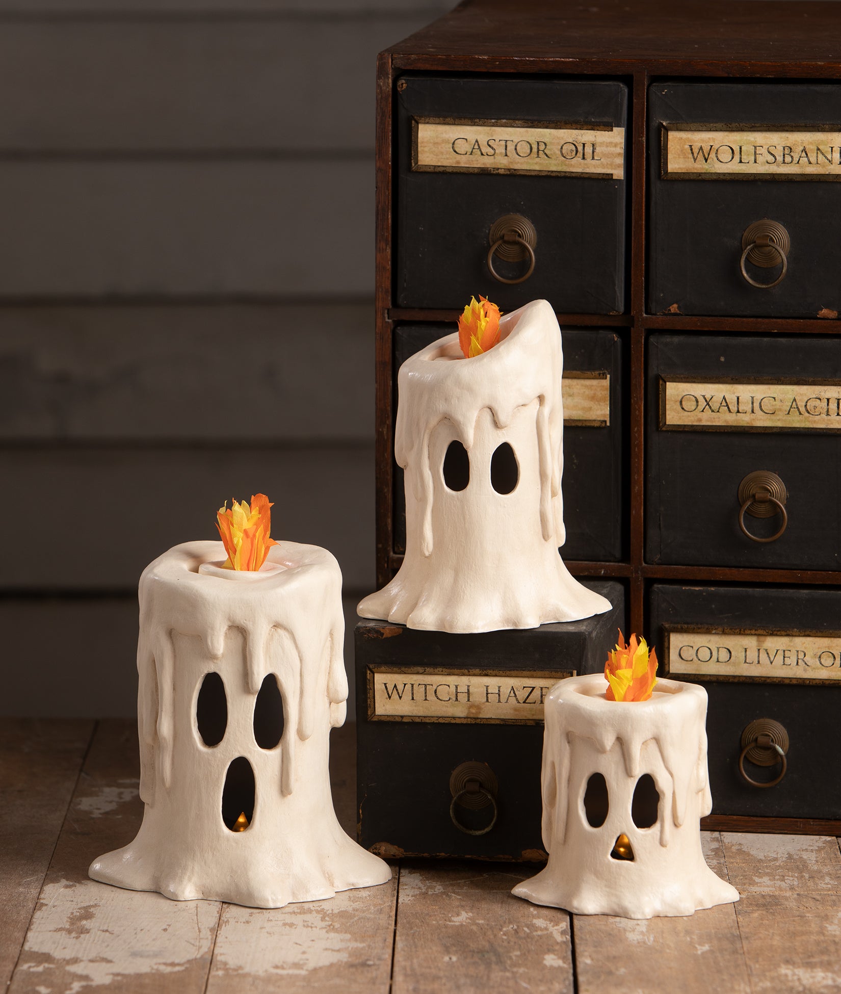 Ghost Candle Luminaries shown decorating a Halloween cabinet. From the Bethany Lowe 2026 Halloween Decorations Collection.