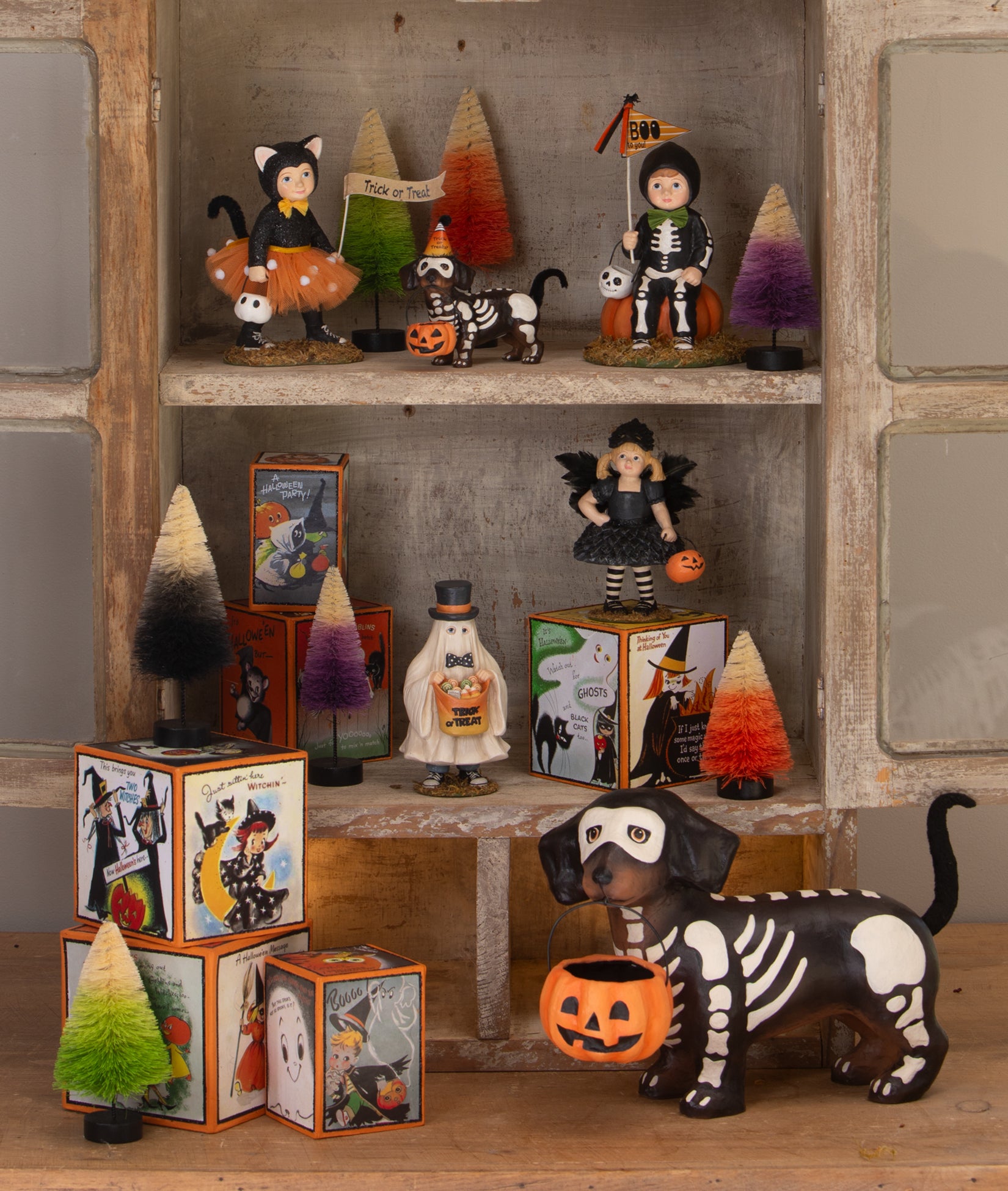 Curio Cabinet Decorated with Halloween figurines by Bethany Lowe Halloween 2025