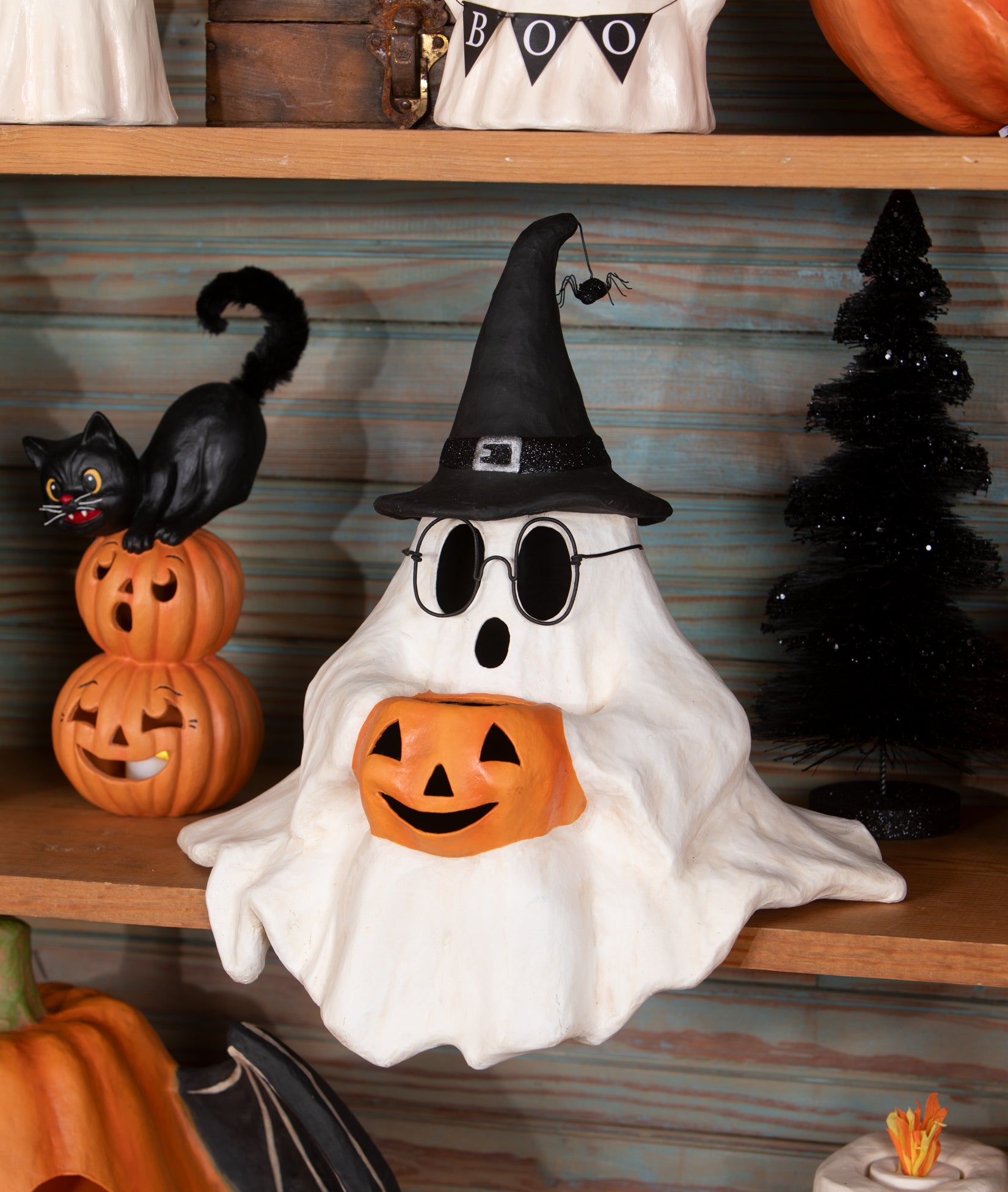Ghost with Glasses made from paper mache. Shelf Sitter perfect for sitting amongst books or Halloween Decorations.