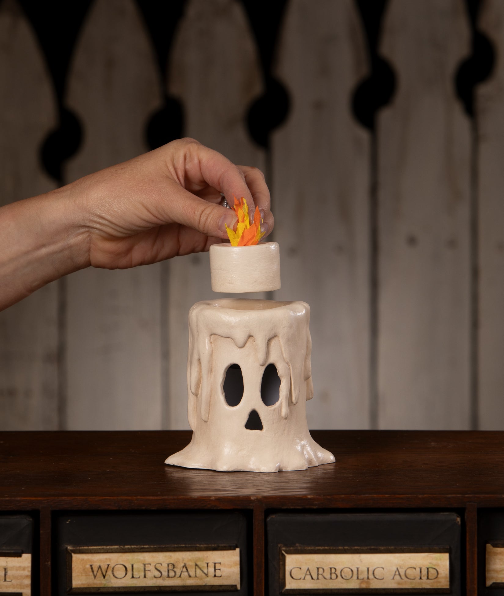 Flam'in Ghost Candle Luminary shown with removable faux flame.