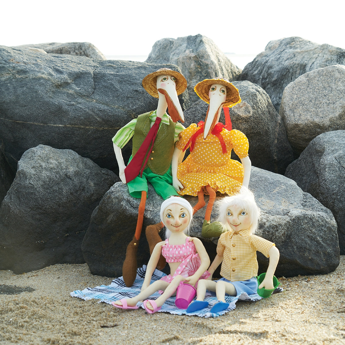 Joe Spencer Dolls pictured at the Beach; Mindy Pelican, Moby Pelican, Tina Tides, and Tommy Tides Dolls by Joe Spencer