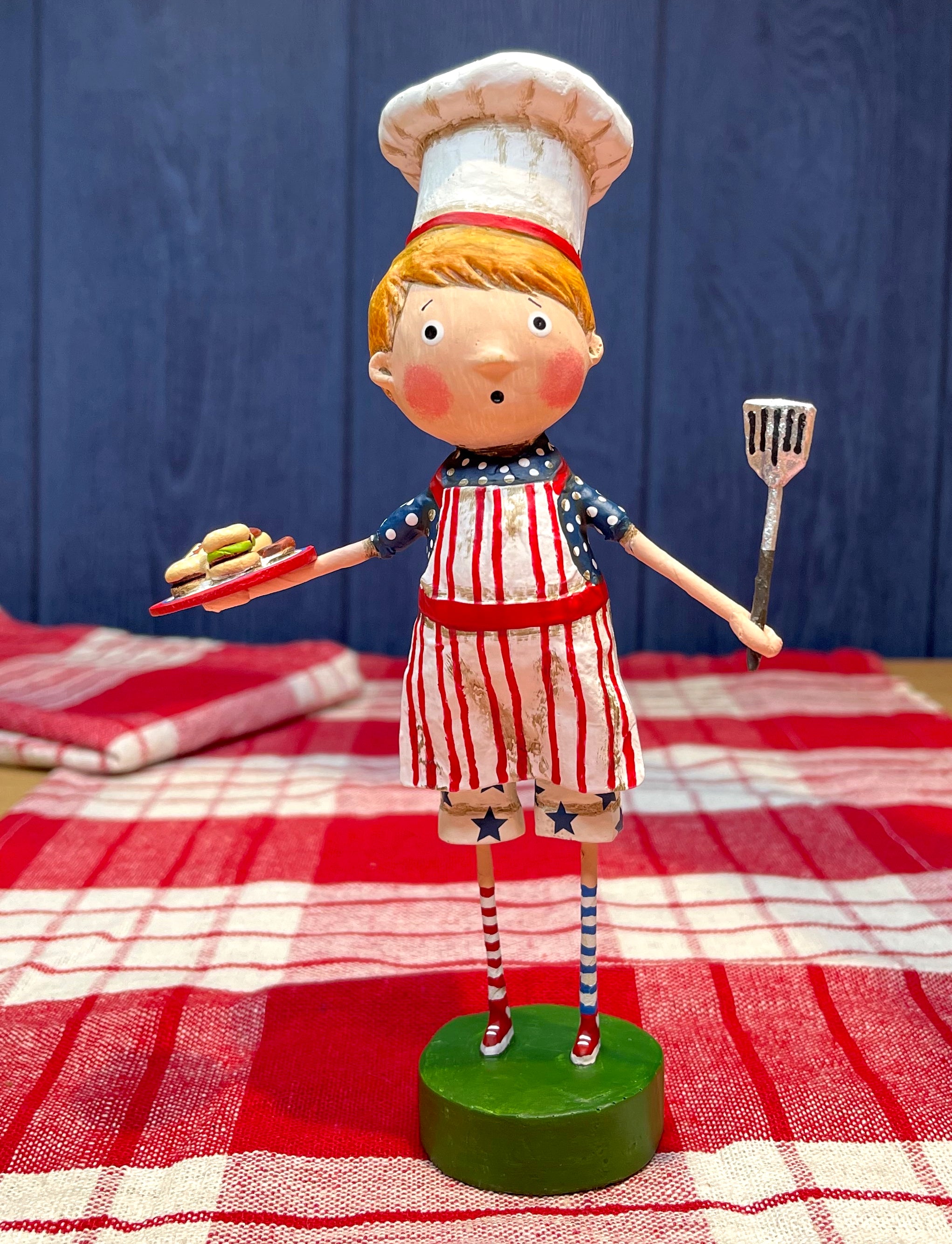 gurine with hot dogs and hamburgers