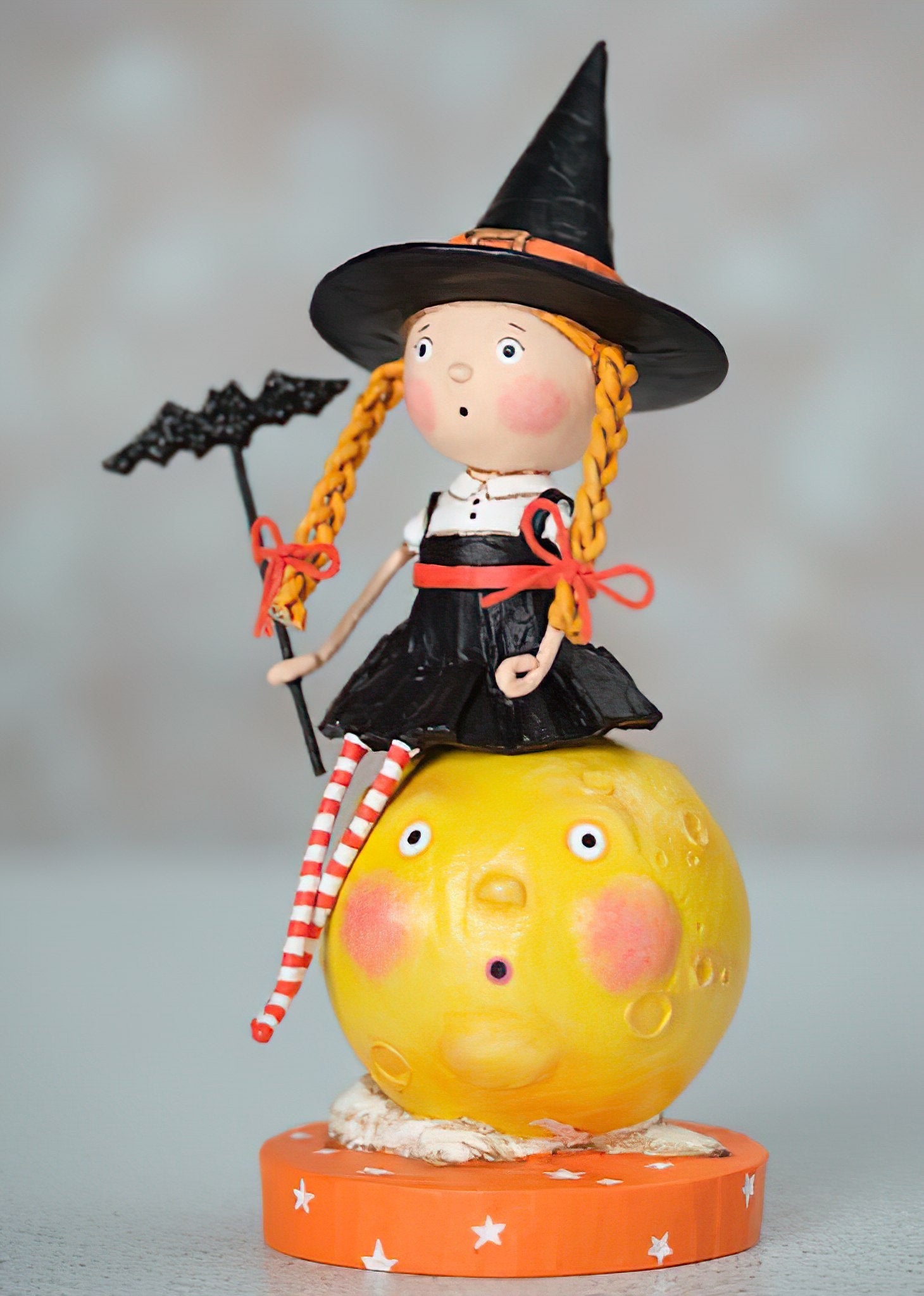 Lori Mitchell Mischief on the Moon Figurine - girl dressed up as a witch sitting on a full moon