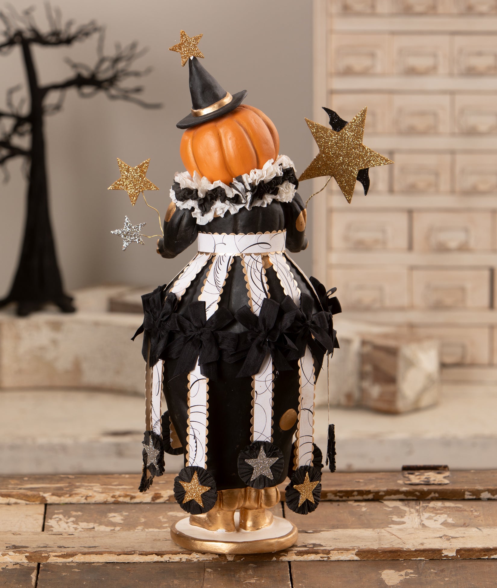 Miss Fancy Pants Jackie Pumpkin Witch Figurine (shown backside) from the Bethany Lowe 2026 Halloween Decorations Collection.