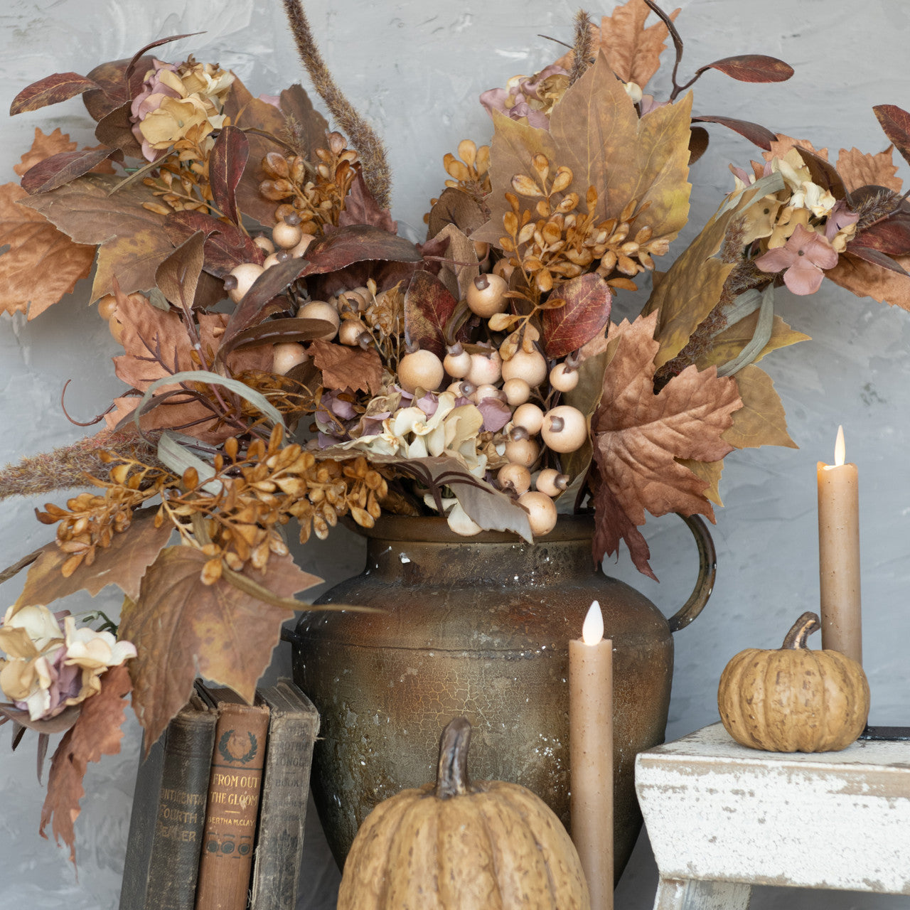 Short Fake Flame Candles in a neutral wheat color shown with fall farmhouse decor
