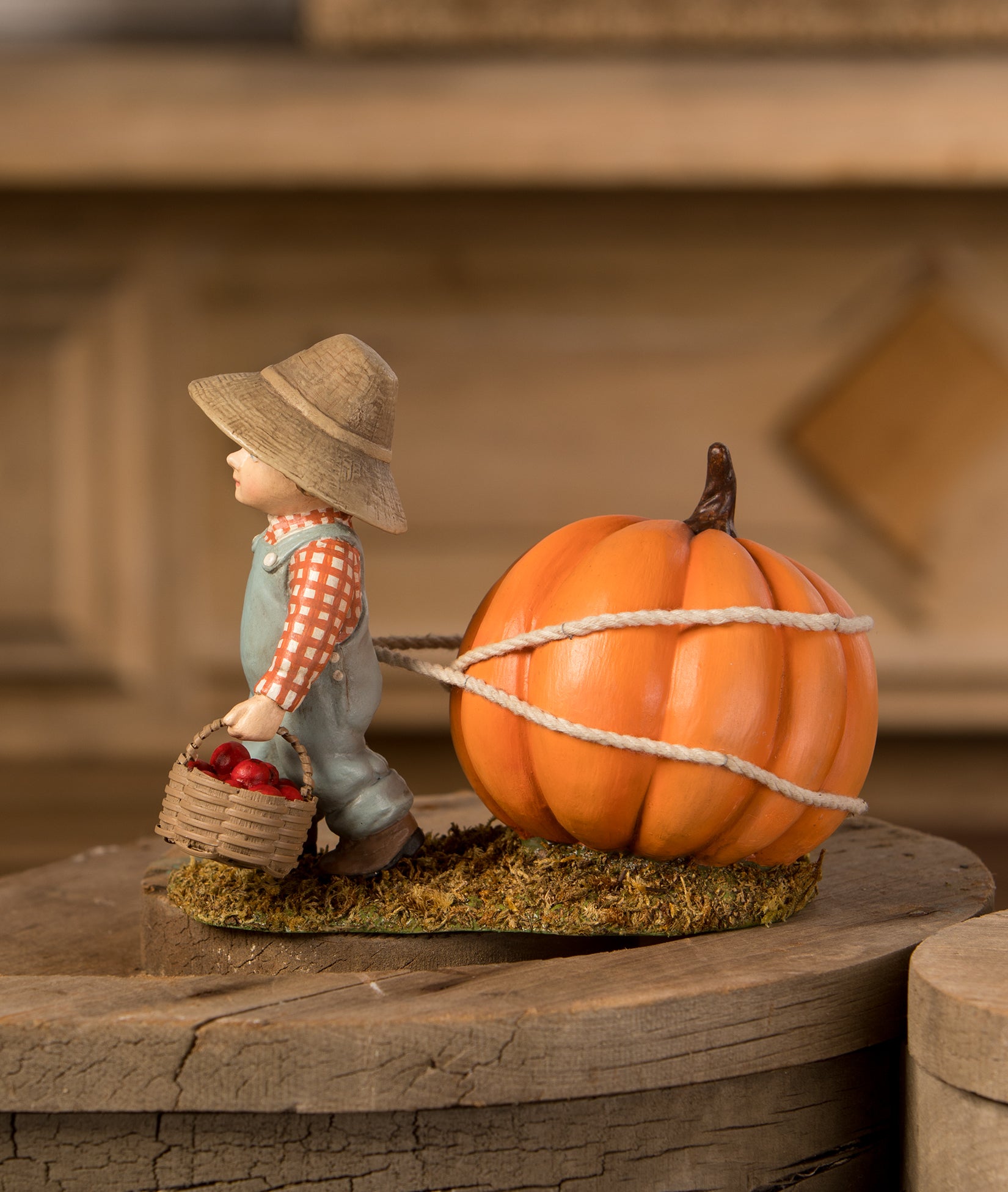 Paulie Pulling Pumpkin Figurine by Bethany Lowe Sideview