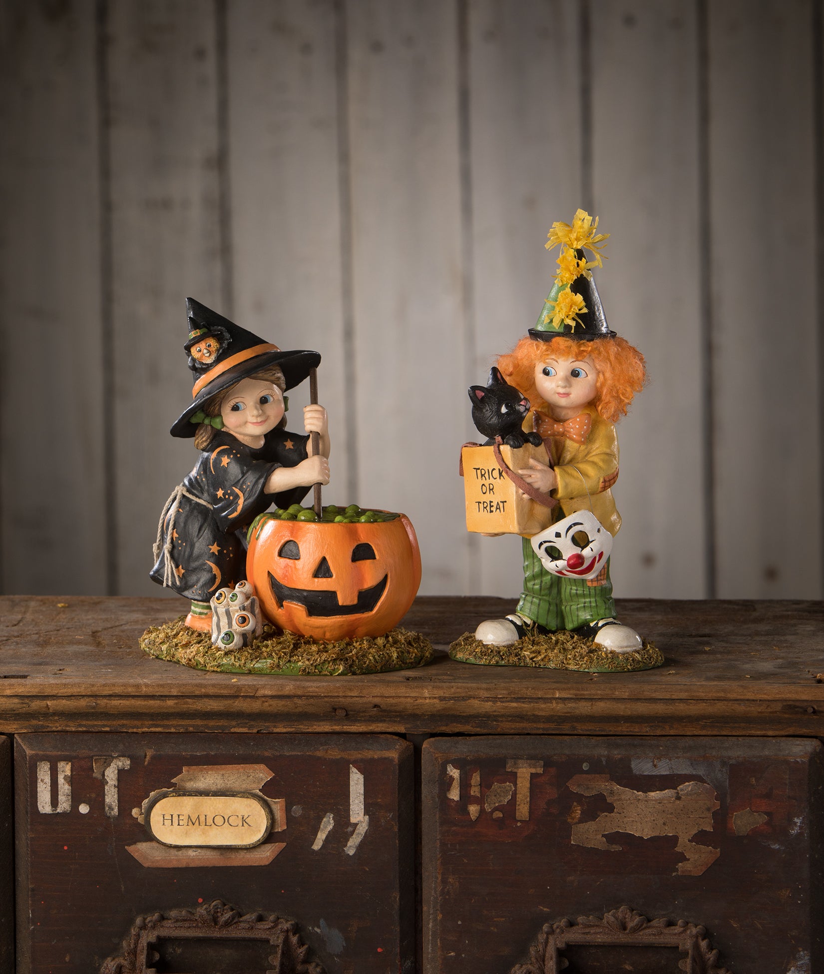 Pumpkin Brewing Piper shown with Clowning Around Carson - Cute Halloween Figurines