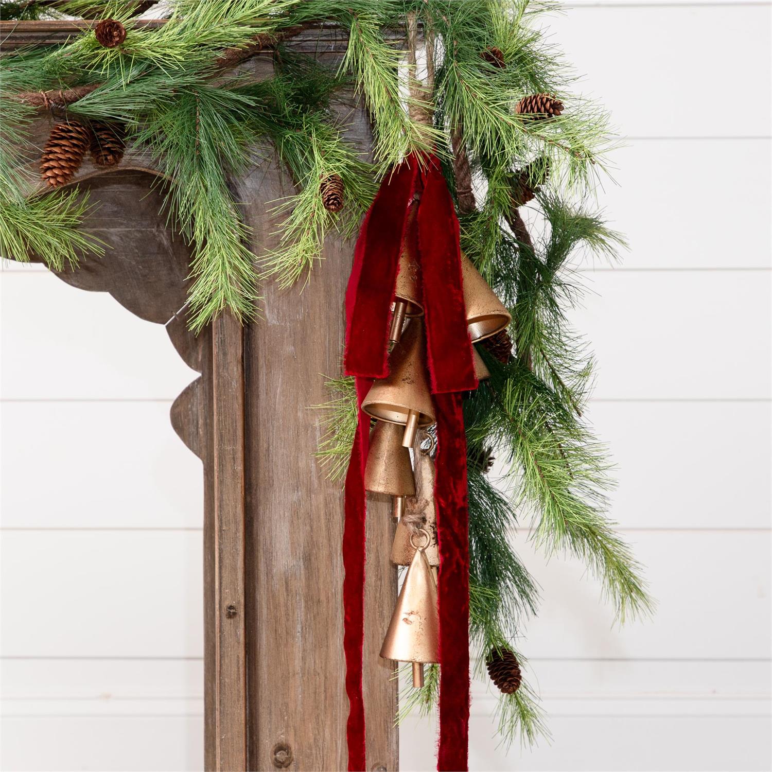 Red Raw Edge Velvet Ribbon shown with Evergreen Garland and Bells