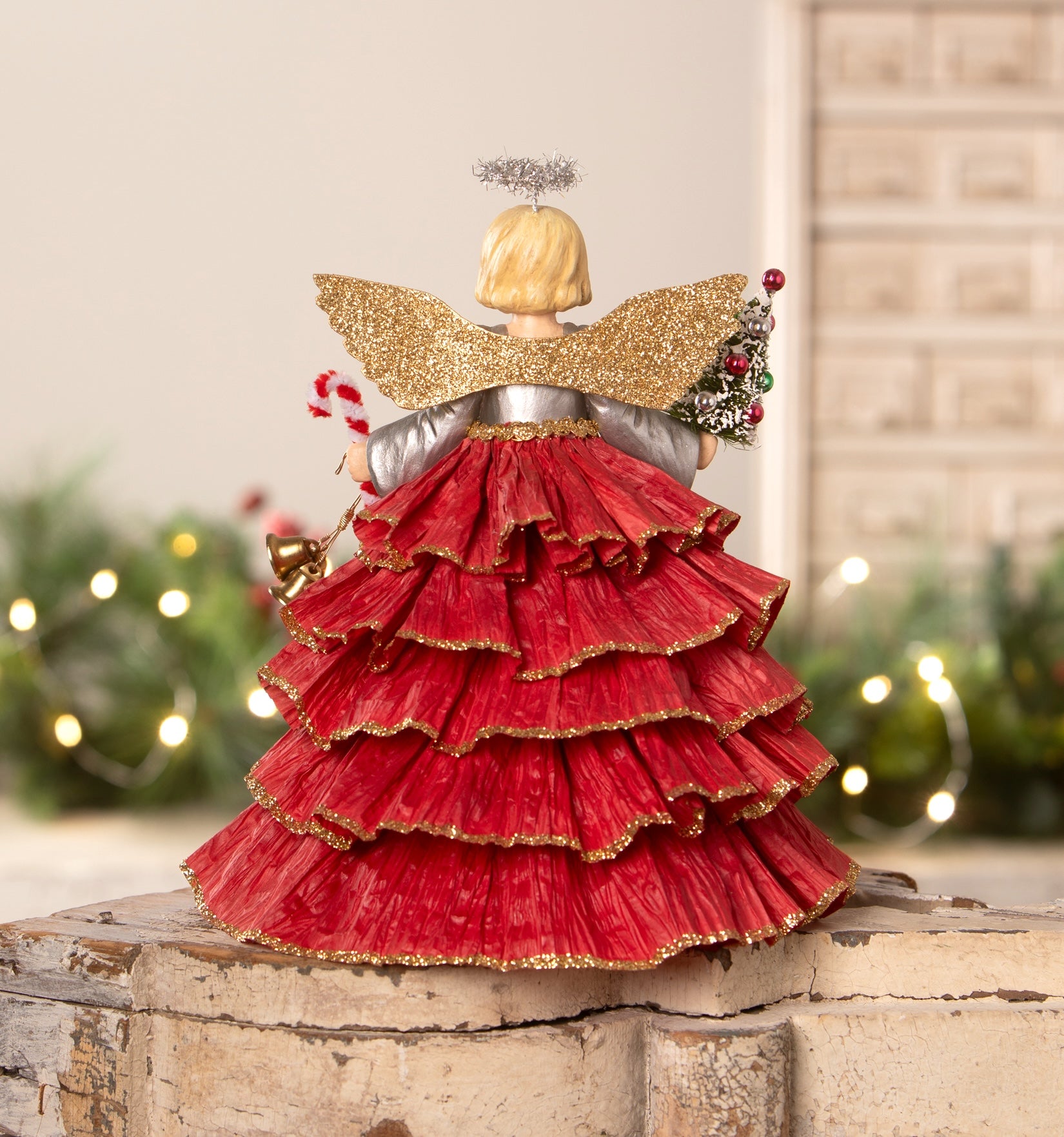 Retro Style Angel Tree Topper in silver, gold, and red. Shown backside.