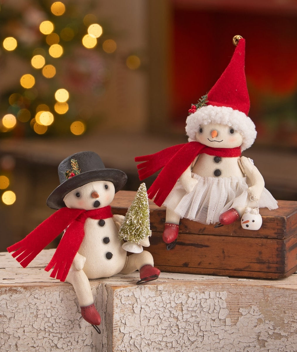 Snowman figurine by Robin Seeber, Bing Flak and Rosemary Flake snowgirl, dressed up for the holidays.