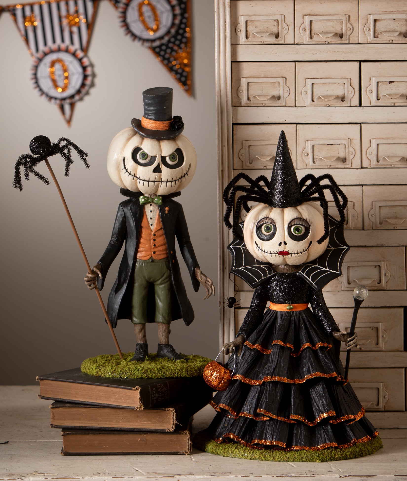 Mr Gourdy & Mrs. Casperita's Night Out - unique Halloween figurines dressed up for a night of mischief. From the 2026 Halloween Collection.