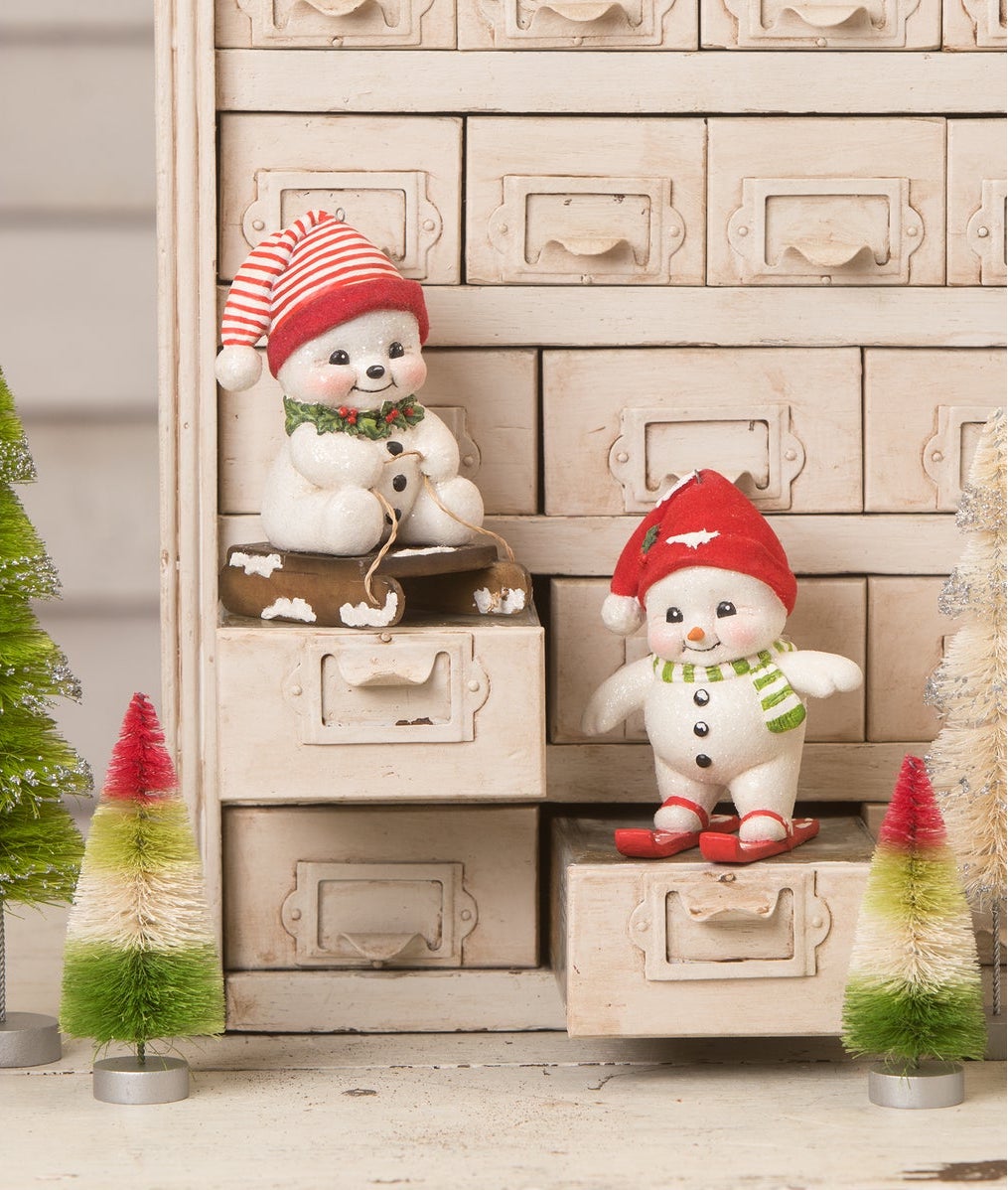 Cute Snowman Figurines, baby snowman sledding and skiing