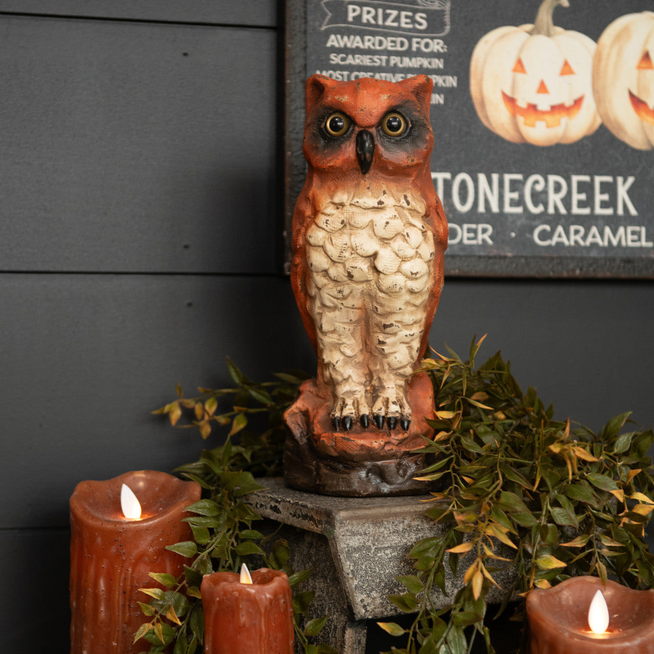 Orange Owl made from paper mache with vintage-style Halloween decorations