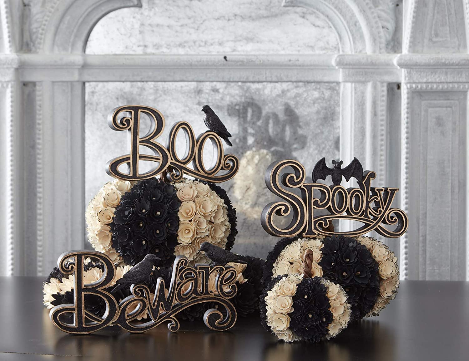 Halloween Table decorated with Boo, Spooky, & Beware Word Signs