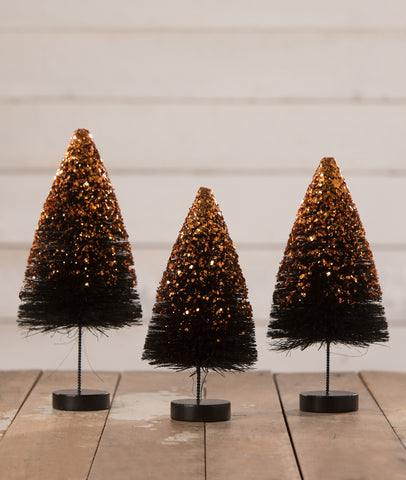 https://theholidaybarn.com/cdn/shop/products/black-bottle-brush-halloween-trees-with-orange-glitter-bethany-lowe-2021_large.jpg?v=1623870942