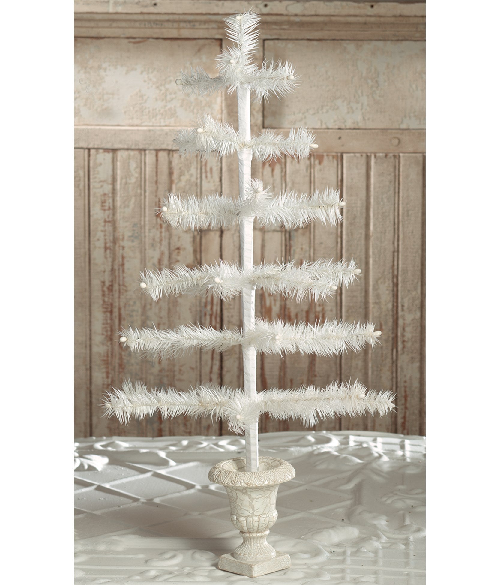 Ivory Feather Tree in Urn Base